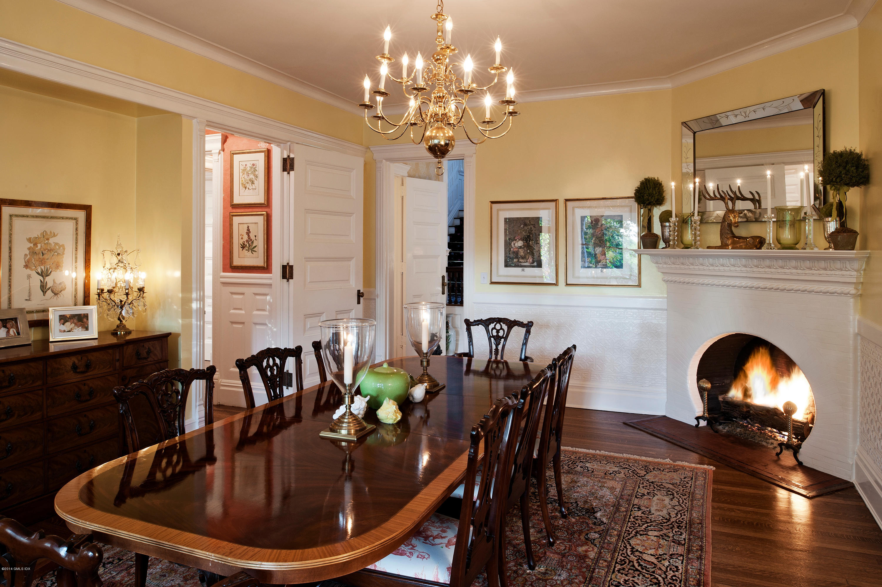 11 Club Road Riverside, CT 06878 - Photo 8 of 16 a dining room with furniture a chandelier and window