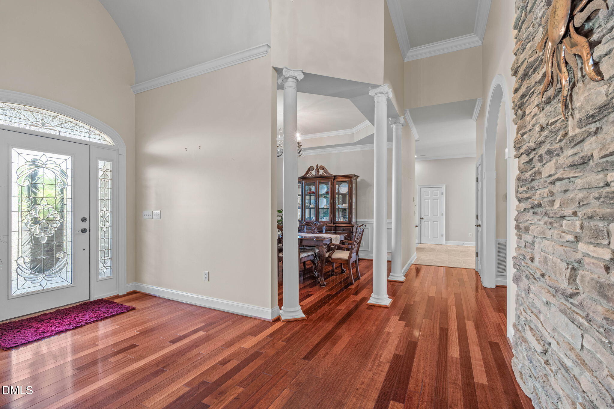 10917 Jordan Road Raleigh, NC 27603 - Photo 12 of 58 a view of empty room with wooden floor and fan