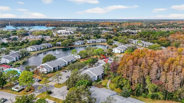 an aerial view of residential building and lake view