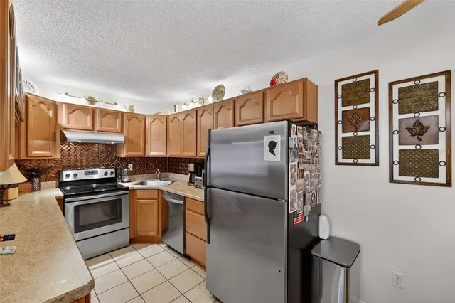 $215,000 | 1258 Pine Ridge Circle West, Unit D1, Tarpon Springs, FL 34688