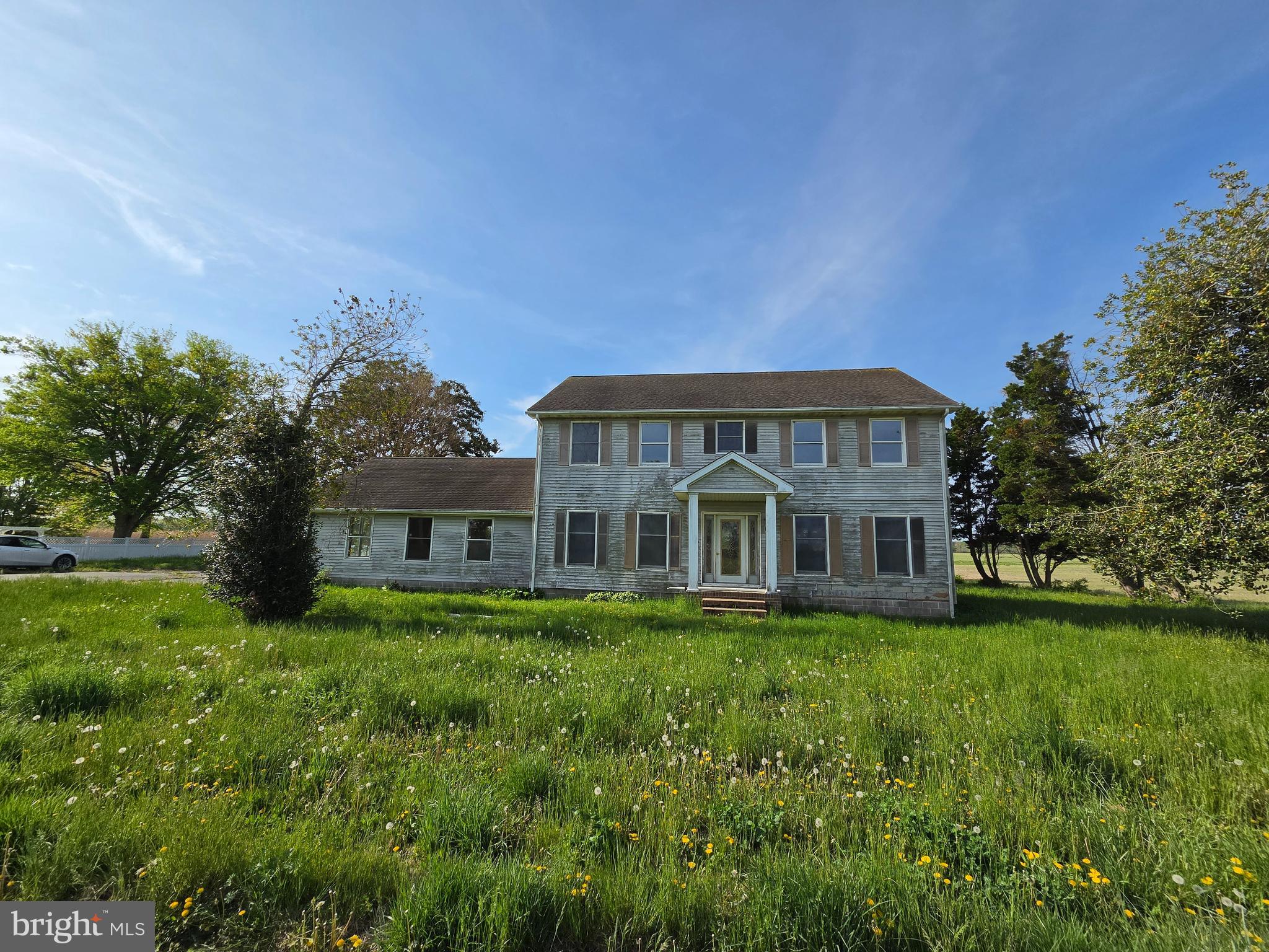 4731 Egypt Road Cambridge, MD 21613 - Photo 4 of 6 a front view of a house with a garden