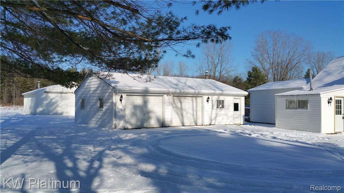 3116 Vincent Road North Street, MI 48049 - Photo 5 of 29 VIEW OF GARAGE AND POLE BARN BEHIND