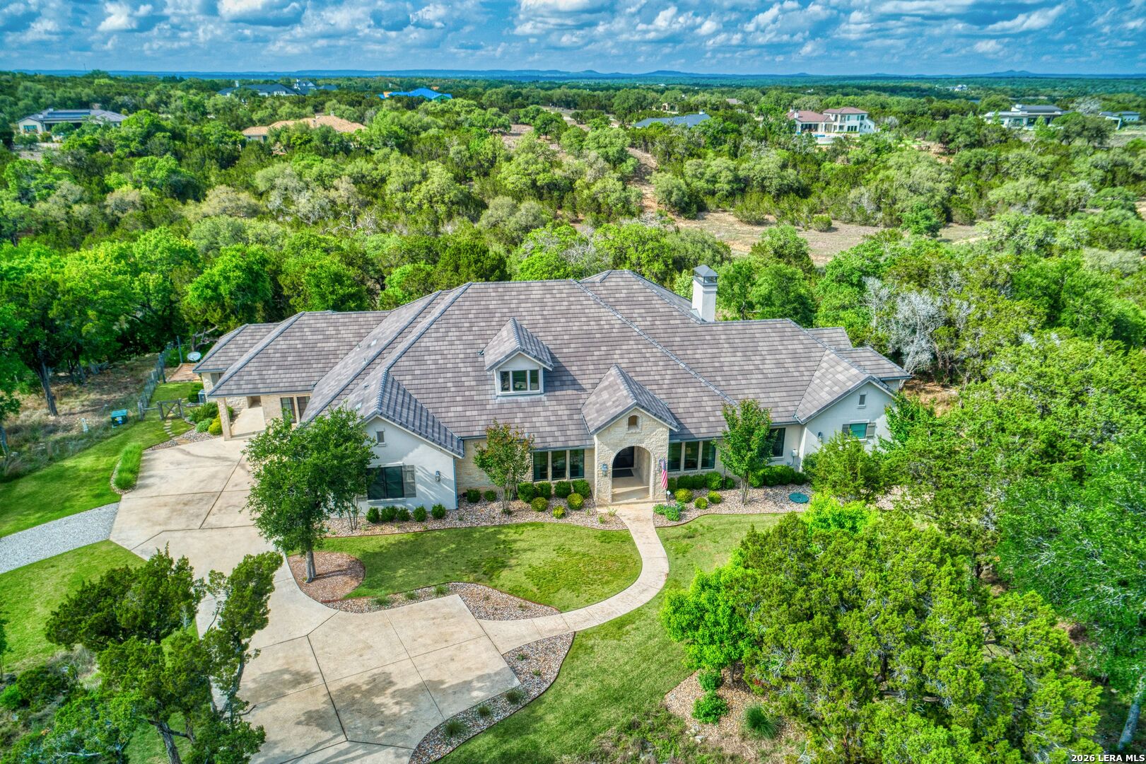 52 Landmark Ridge Bergheim, TX 78004 - Photo 1 of 24 a view of a house with a yard and plants