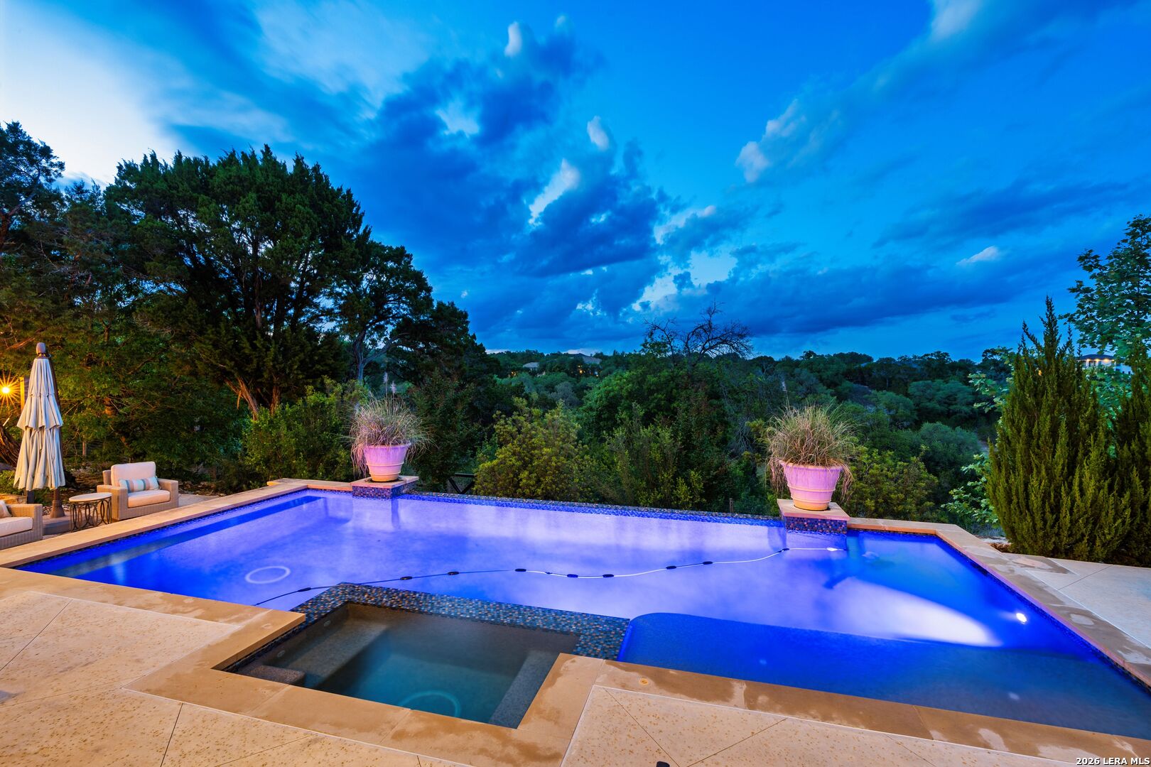 52 Landmark Ridge Bergheim, TX 78004 - Photo 3 of 24 a view of a swimming pool with an outdoor seating