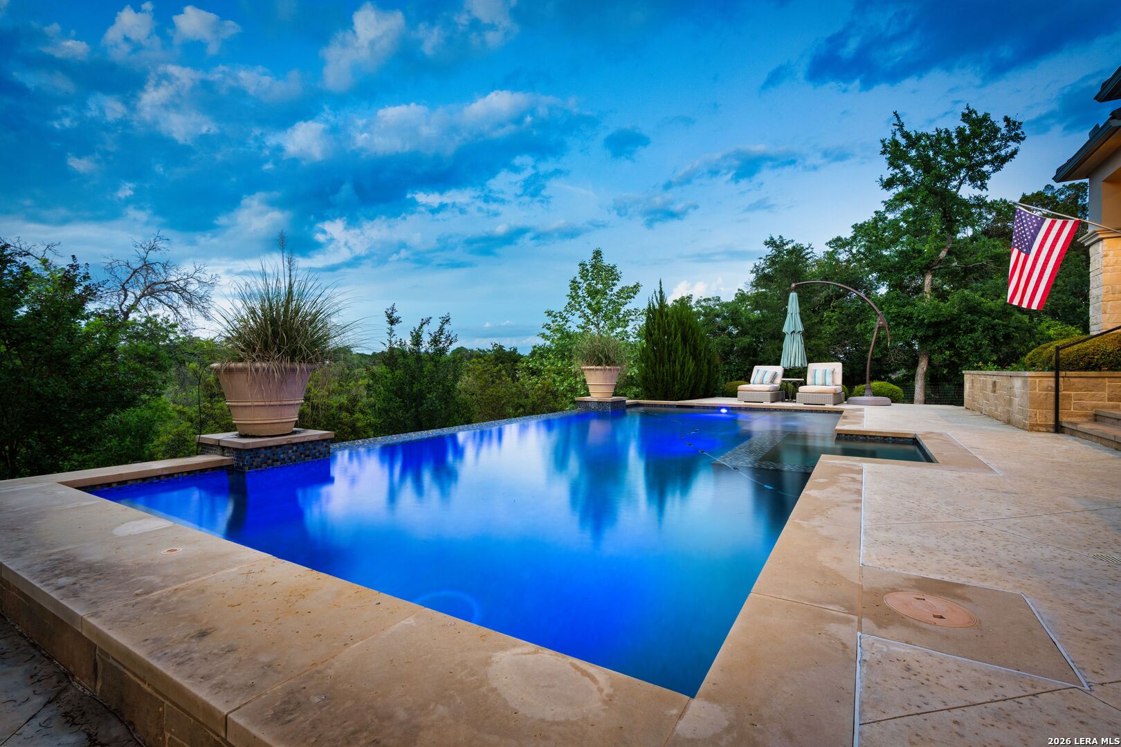 52 Landmark Ridge Bergheim, TX 78004 - Photo 4 of 24 a view of a swimming pool with chairs