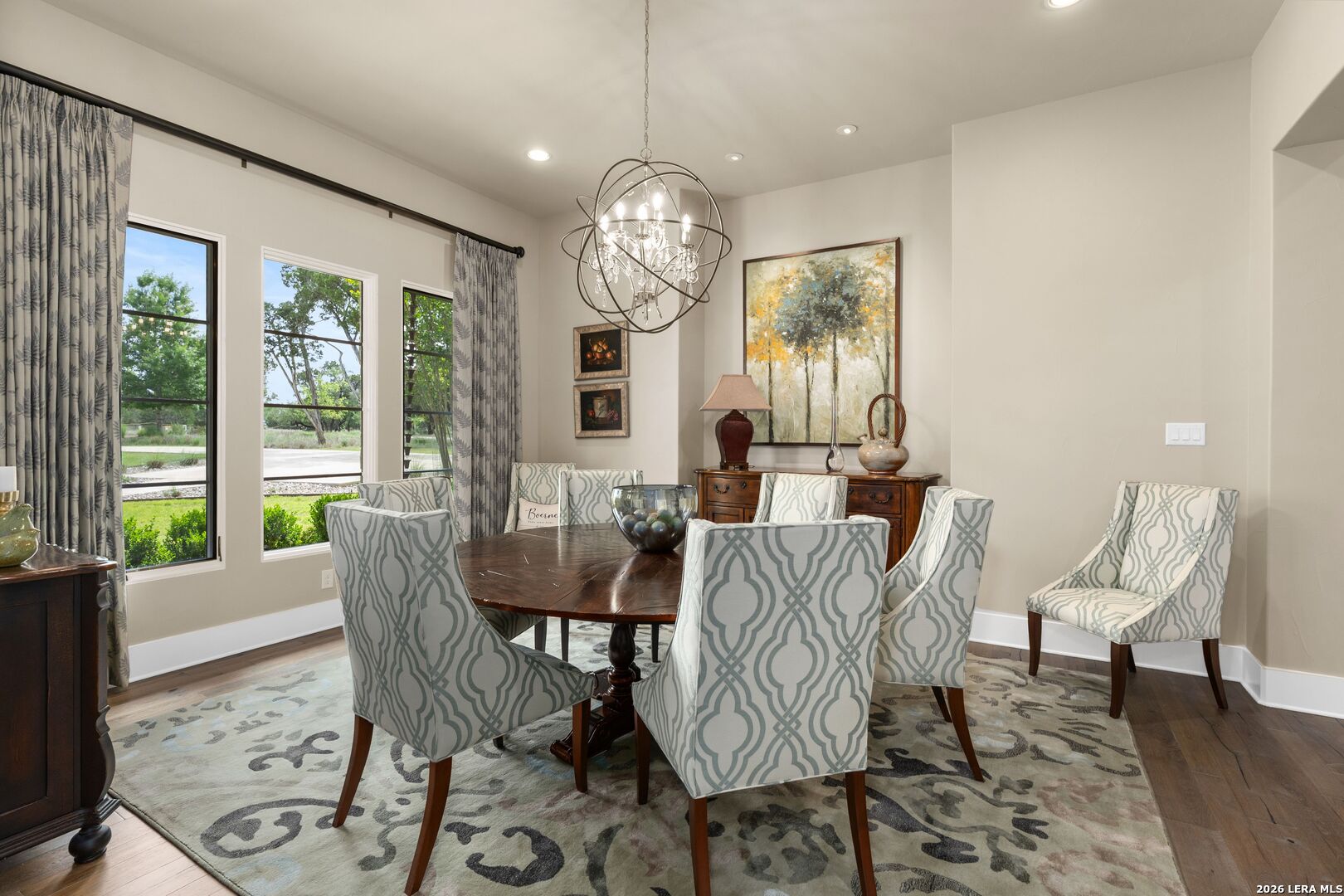 52 Landmark Ridge Bergheim, TX 78004 - Photo 10 of 24 a view of a dining room with furniture a chandelier and wooden floor