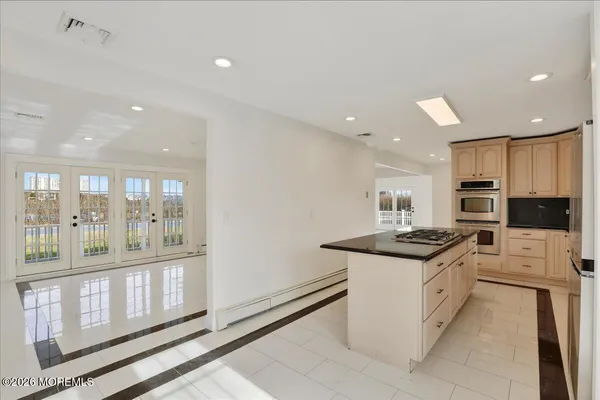 a view of a kitchen with kitchen