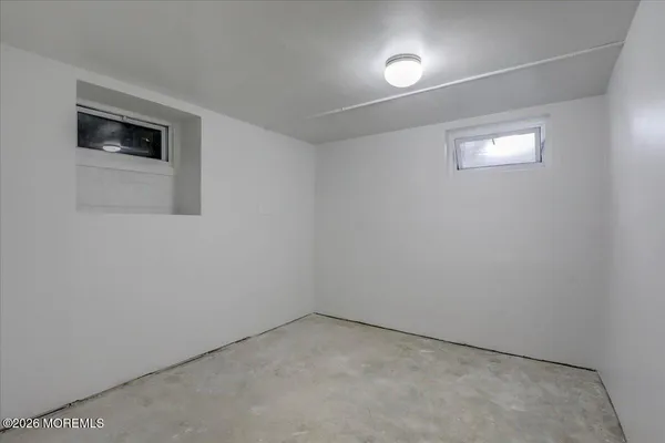 a view of swimming pool with outdoor seating and plants