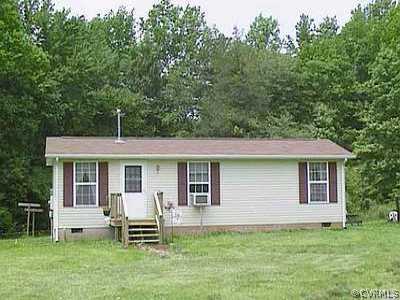 271 Buckner Road Bumpass, VA 23024 - Photo 1 of 1 a front view of a house with a garden