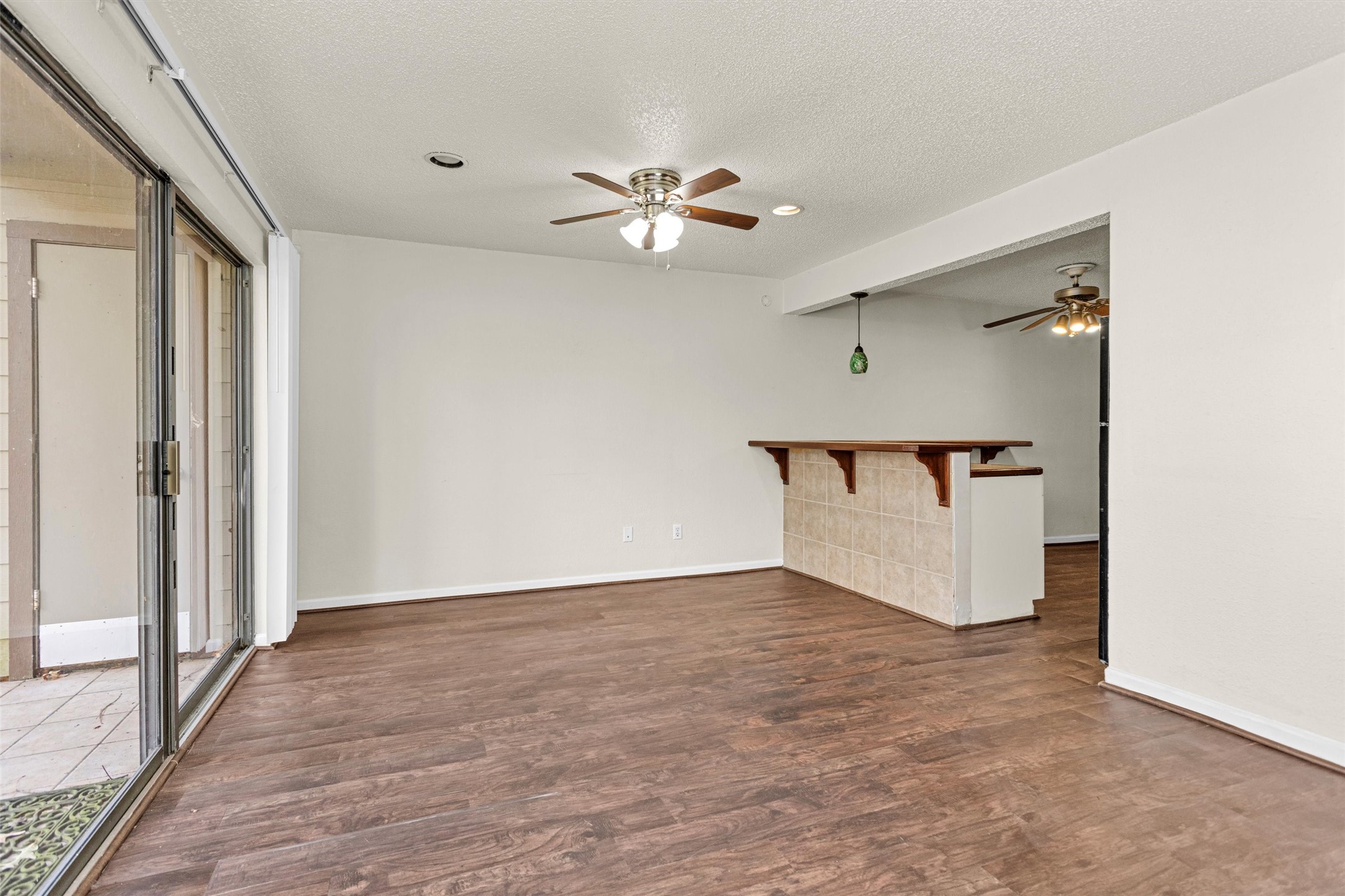 12900 Walden Road, Unit 513 Montgomery, TX 77356 - Photo 6 of 20 a view of a livingroom with a ceiling fan