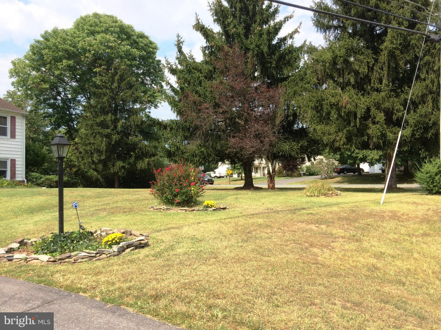 17030 Hughes Road Poolesville, MD 20837 - Photo 2 of 24 a view of a swimming pool with an outdoor space