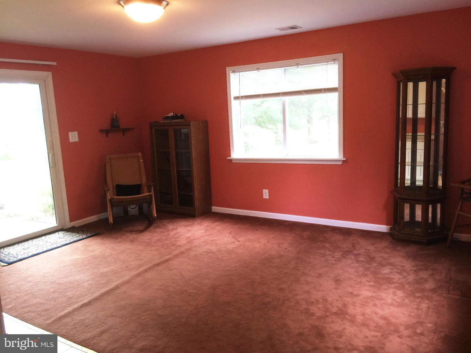 17030 Hughes Road Poolesville, MD 20837 - Photo 17 of 24 an empty room with windows