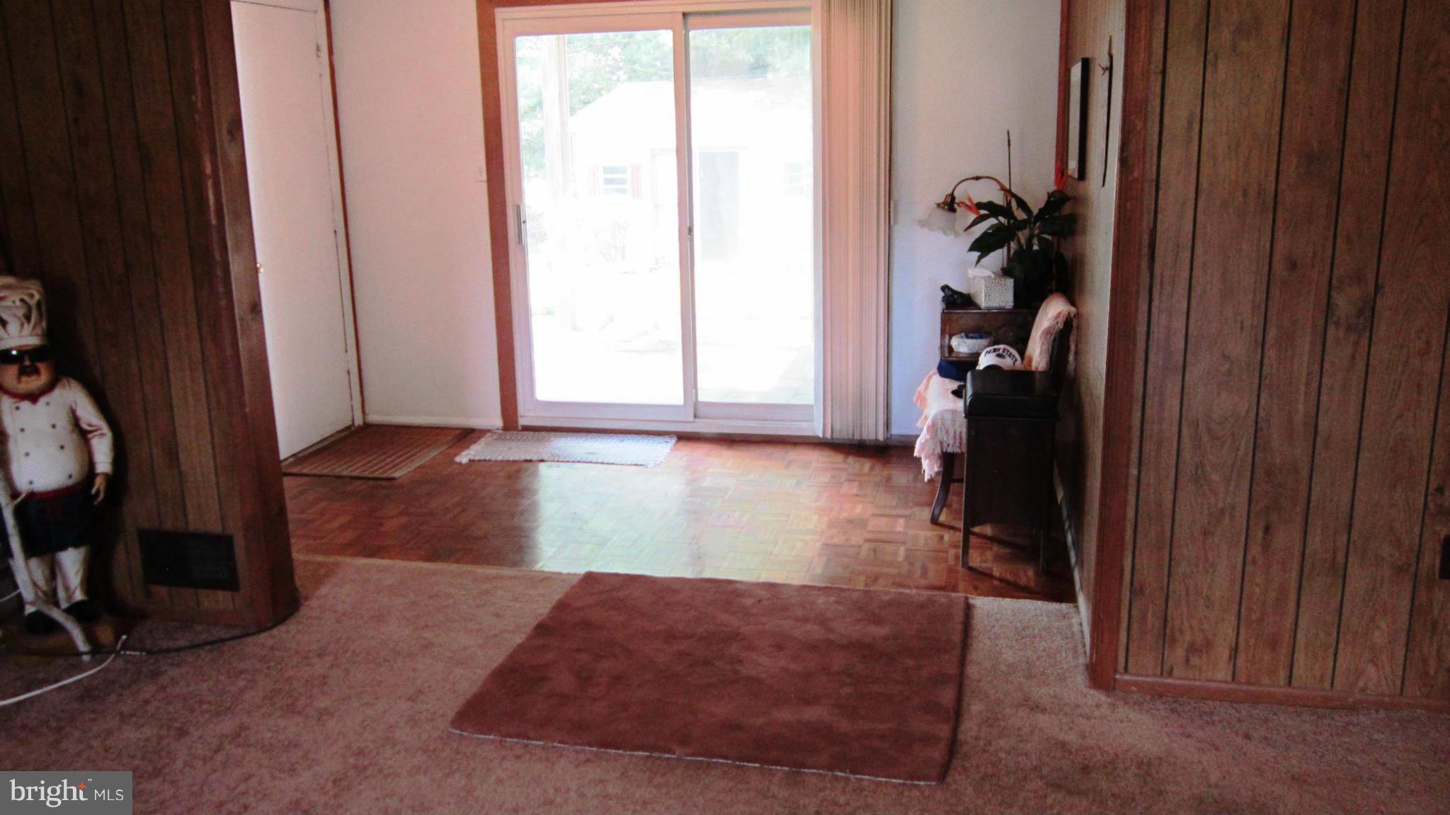 17030 Hughes Road Poolesville, MD 20837 - Photo 20 of 24 a living room with furniture and a window