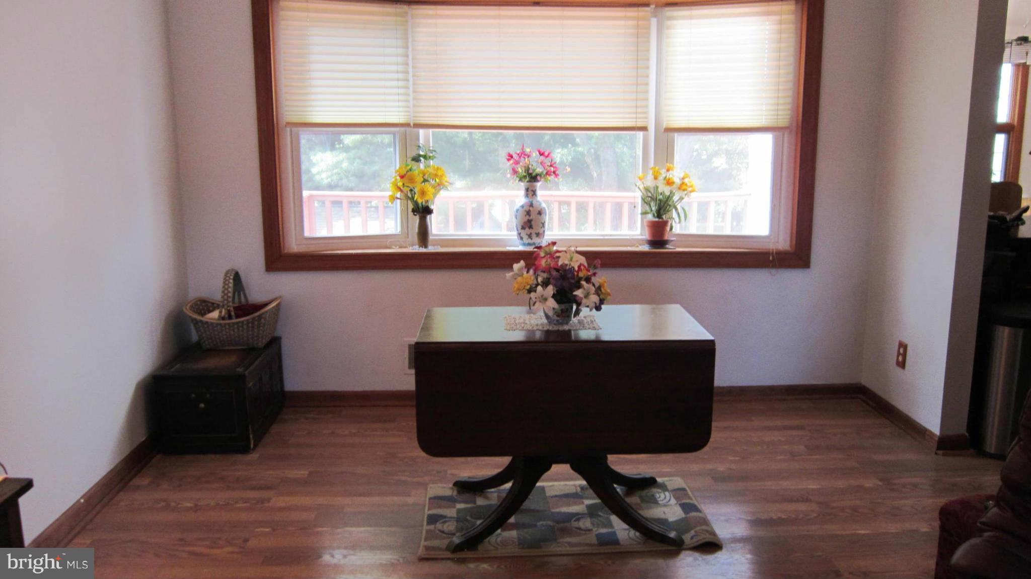 17030 Hughes Road Poolesville, MD 20837 - Photo 9 of 24 a room with furniture and window