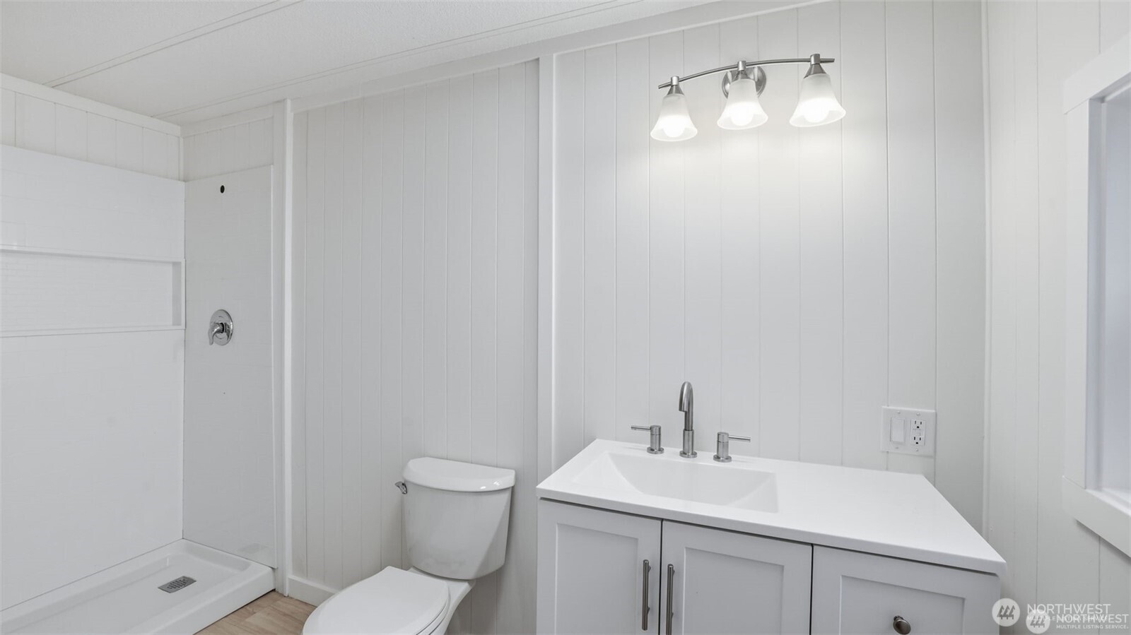 201 Union Avenue Southeast, Unit 247 Renton, WA 98059 - Photo 17 of 32 a bathroom with a sink toilet and shower