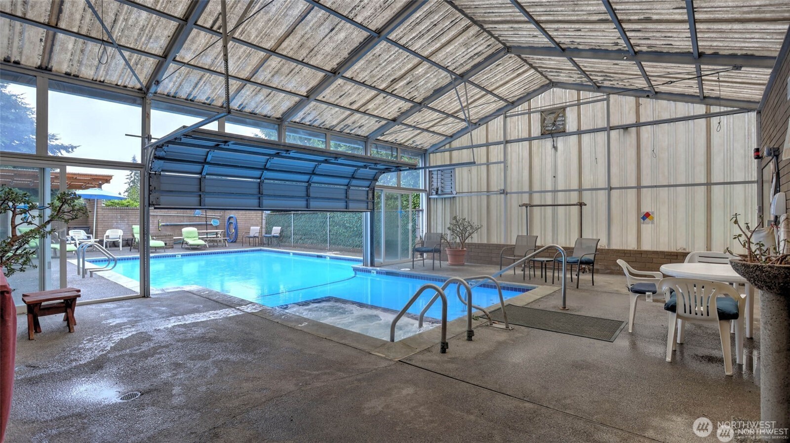 201 Union Avenue Southeast, Unit 247 Renton, WA 98059 - Photo 24 of 32 a view of swimming pool with outdoor seating