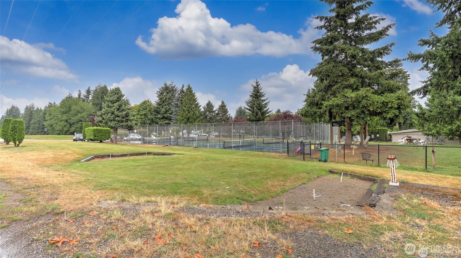 201 Union Avenue Southeast, Unit 247 Renton, WA 98059 - Photo 29 of 32 a view of swimming pool with a yard