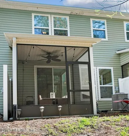 a view of a house with a window and wooden floor