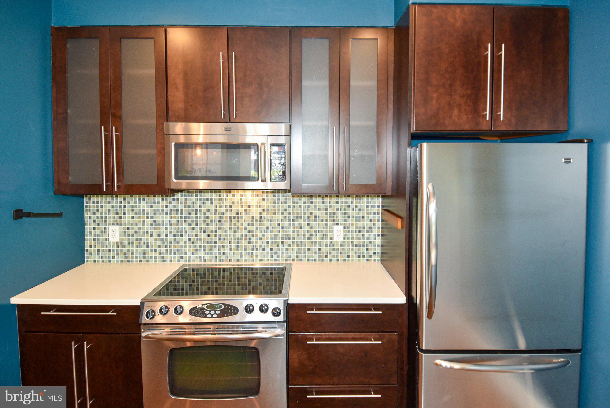 1316 9th Street Northwest Washington, DC 20001 - Photo 24 of 44 Modern kitchen with sleek finishes.
