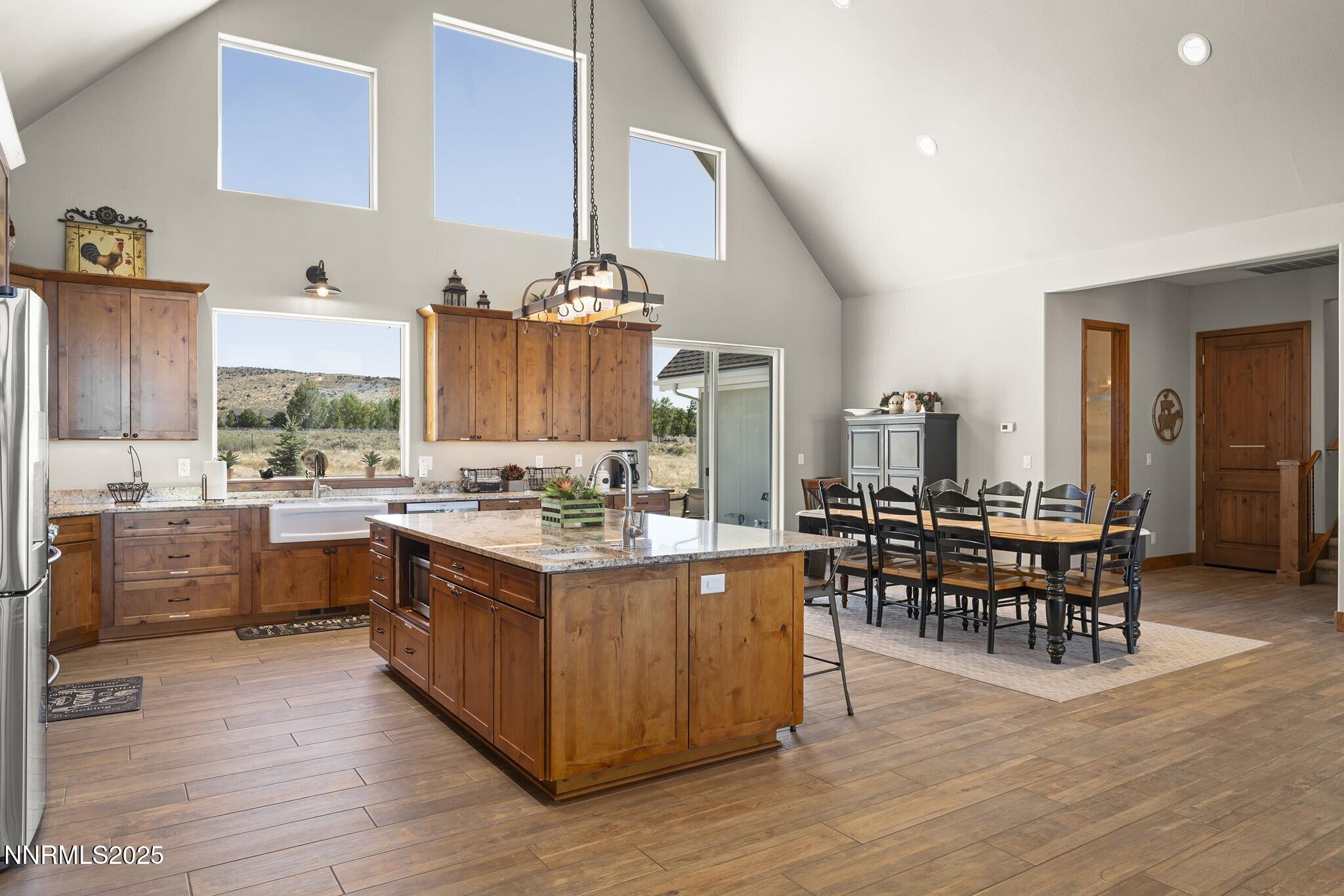 1240 Antelope Valley Road Reno, NV 89508 - Photo 12 of 60 a kitchen with lots of counter top space and dining table