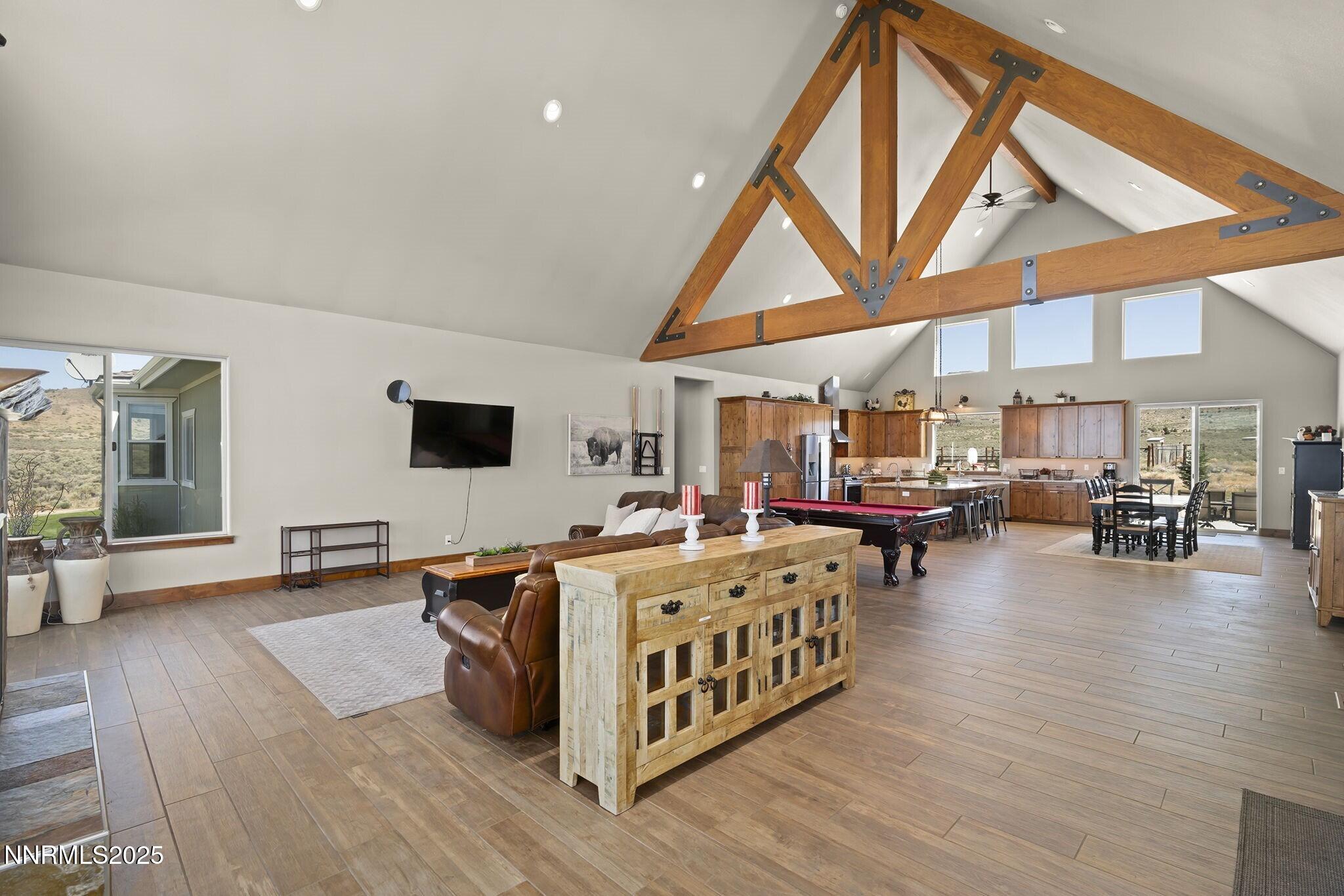 1240 Antelope Valley Road Reno, NV 89508 - Photo 13 of 60 a living room with furniture and a flat screen tv
