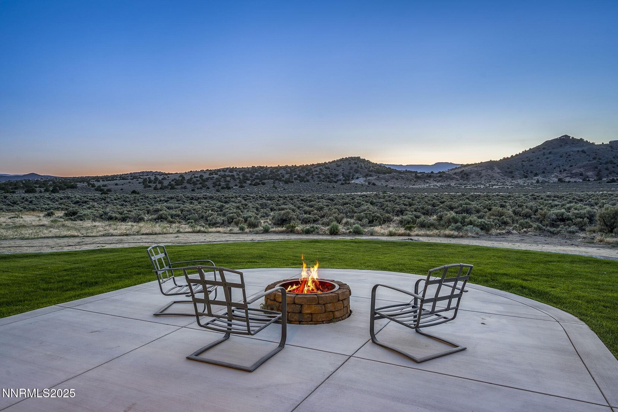 1240 Antelope Valley Road Reno, NV 89508 - Photo 2 of 60 a view of a chairs and table in the terrace