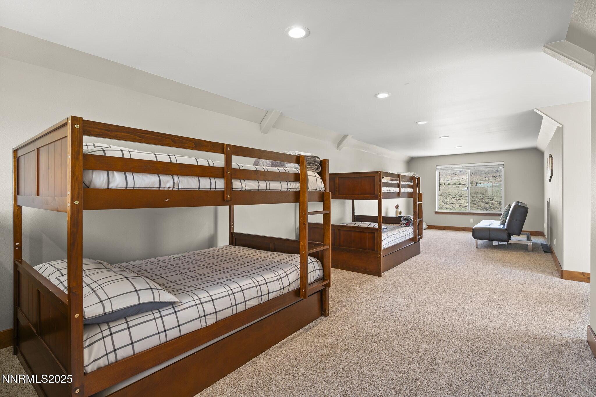 1240 Antelope Valley Road Reno, NV 89508 - Photo 28 of 60 a bedroom with a bed and large window
