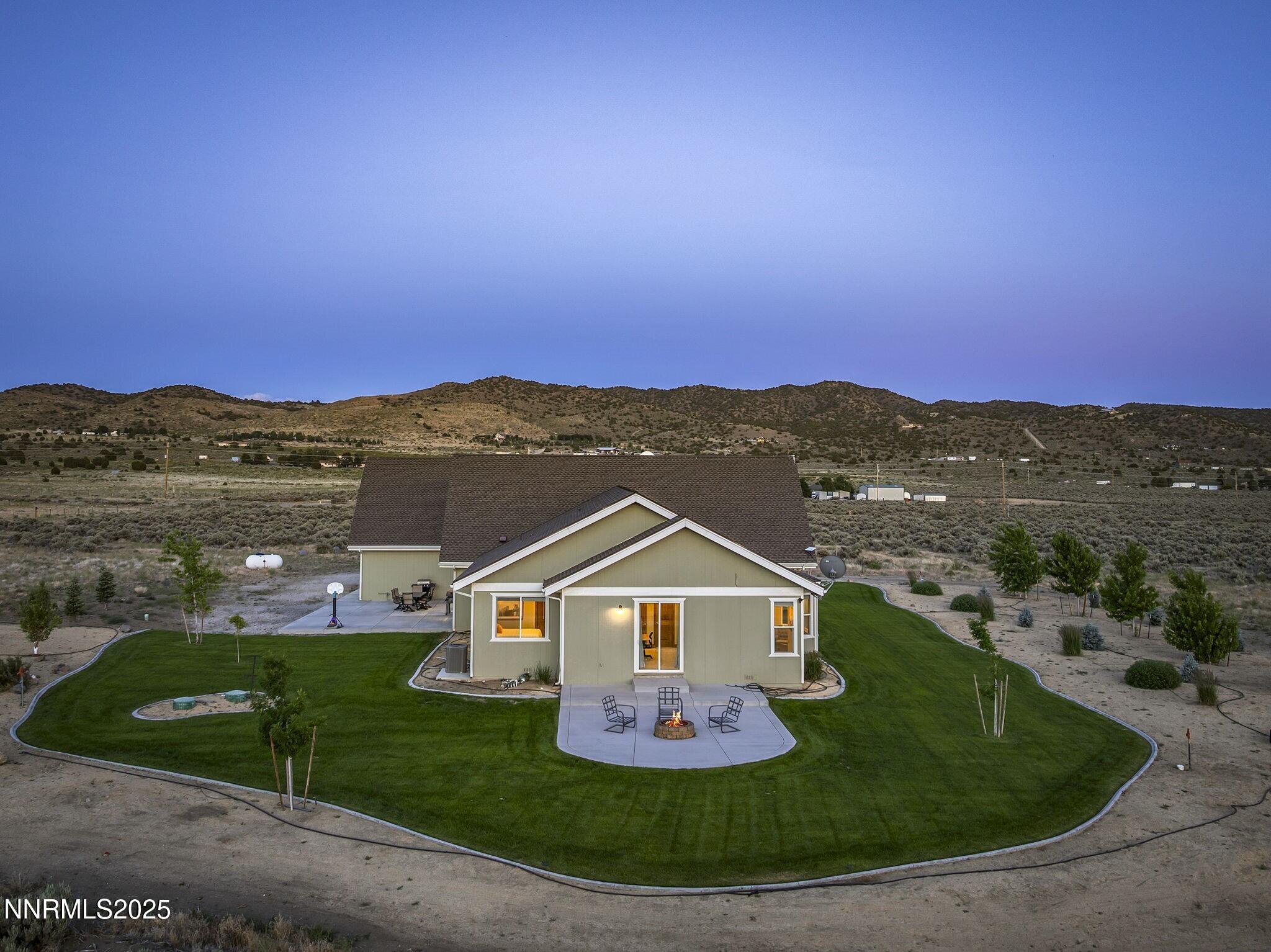 1240 Antelope Valley Road Reno, NV 89508 - Photo 32 of 60 an aerial view of a house with a yard