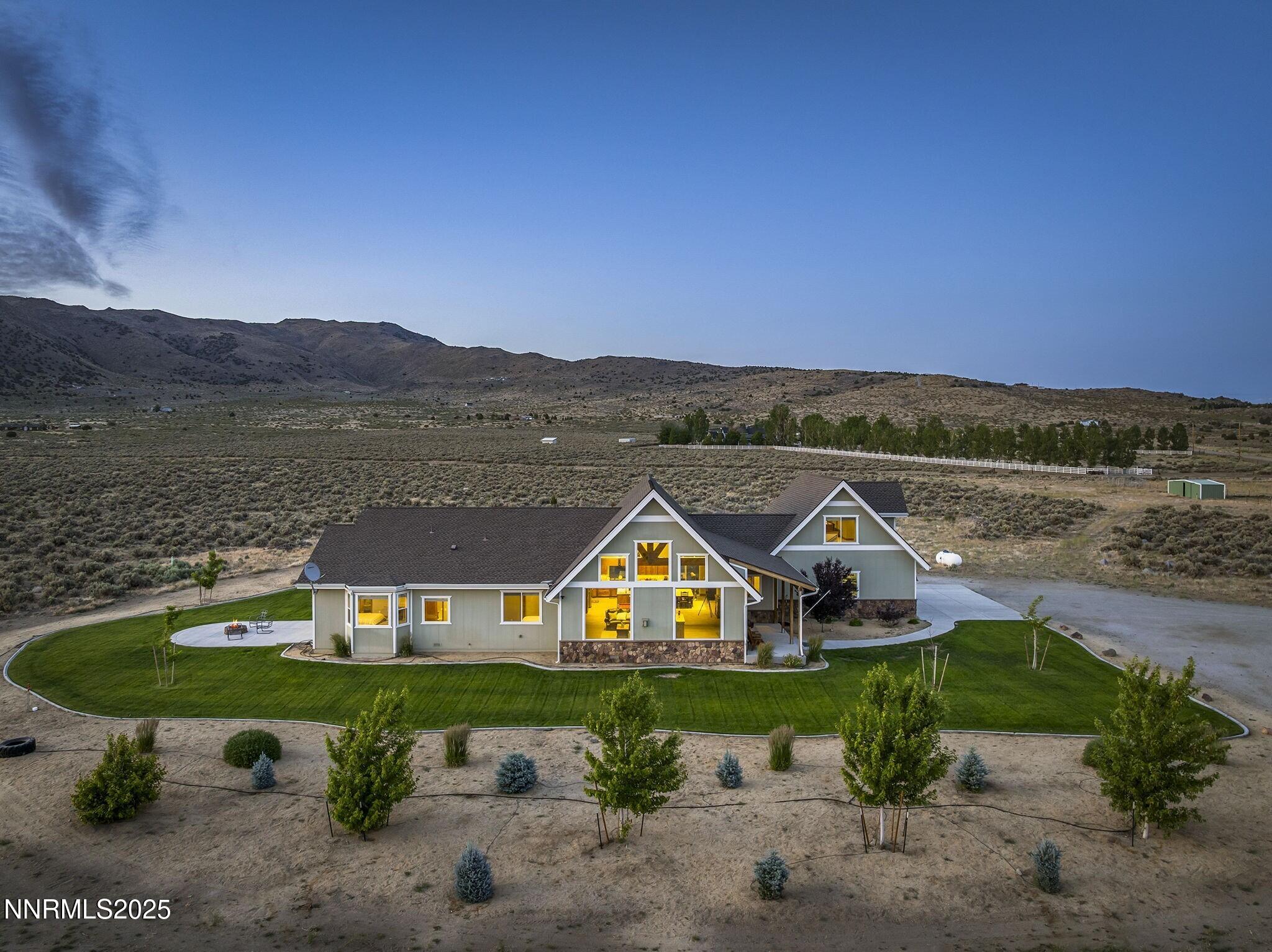 1240 Antelope Valley Road Reno, NV 89508 - Photo 35 of 60 a view of a lake with a mountain in the background