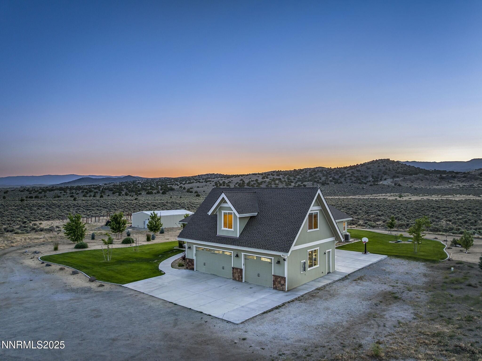 1240 Antelope Valley Road Reno, NV 89508 - Photo 36 of 60 a view of a terrace with a garden and deck