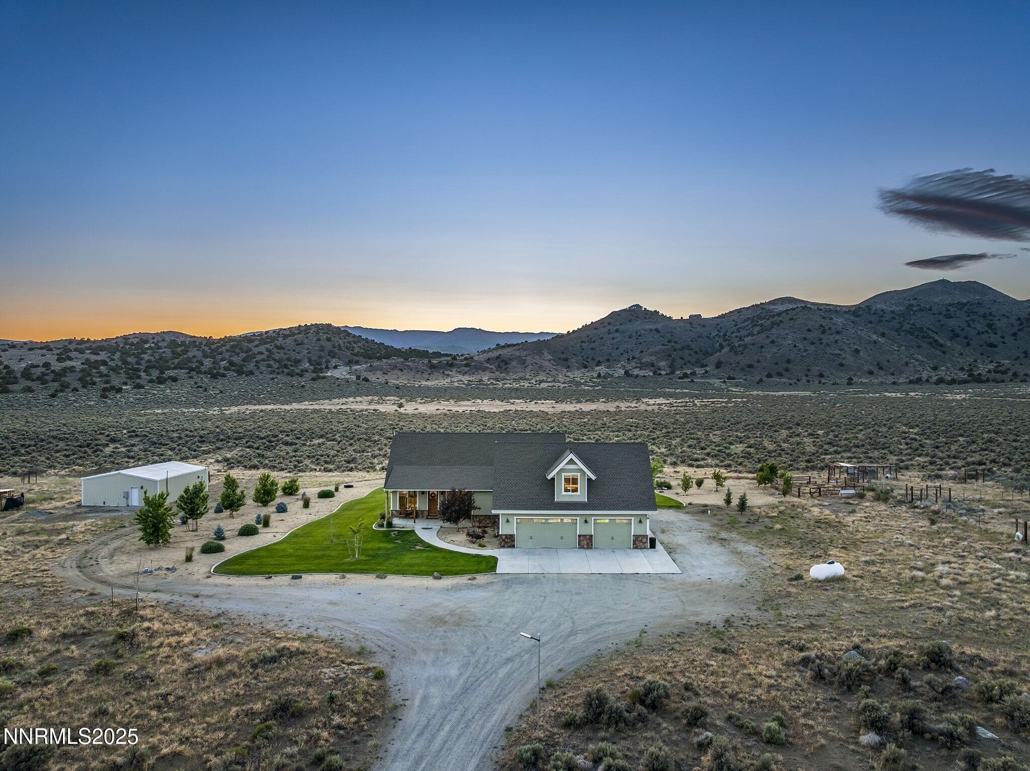 1240 Antelope Valley Road Reno, NV 89508 - Photo 42 of 60 a view of a town with mountains in the background