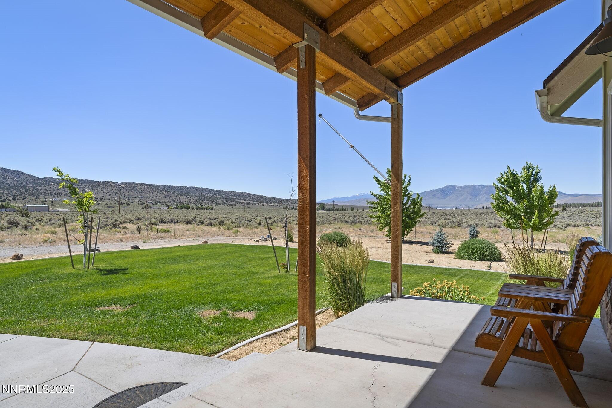 1240 Antelope Valley Road Reno, NV 89508 - Photo 45 of 60 a view of a patio with a table and chairs