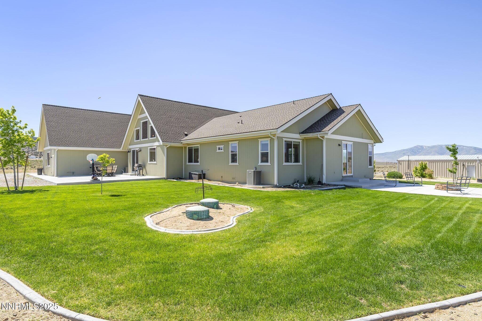 1240 Antelope Valley Road Reno, NV 89508 - Photo 46 of 60 a view of a big house with a swimming pool