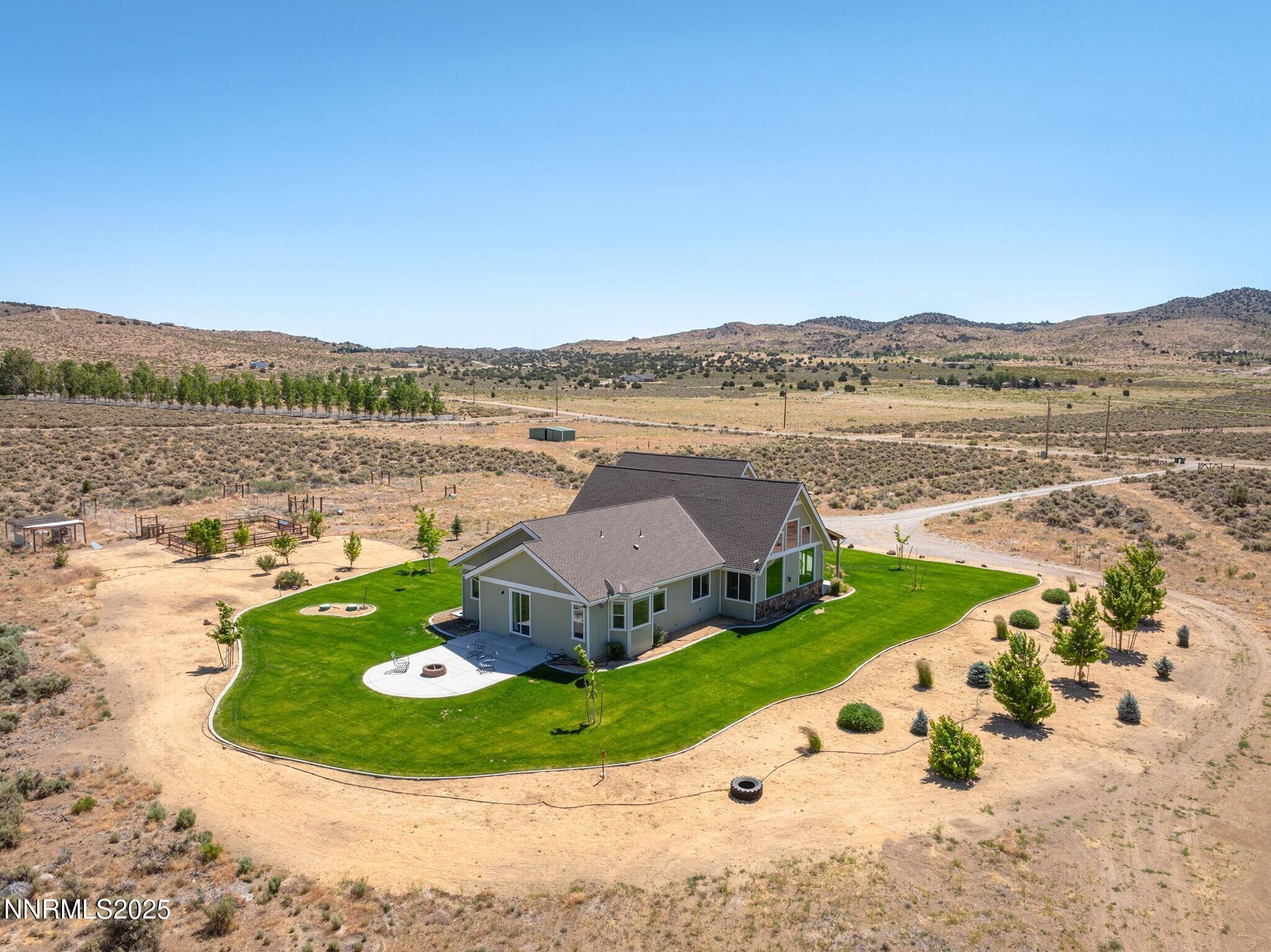 1240 Antelope Valley Road Reno, NV 89508 - Photo 47 of 60 a view of a lake with a mountain