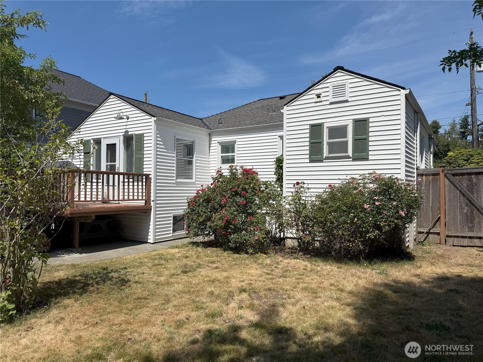 4329 Northeast 56th Street Seattle, WA 98105 - Photo 31 of 34 a front view of a house with a yard