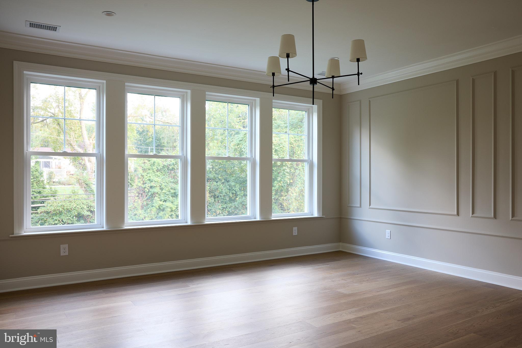 416 Glenway Road Glenside, PA 19038 - Photo 11 of 19 a view of an empty room with wooden floor and a window