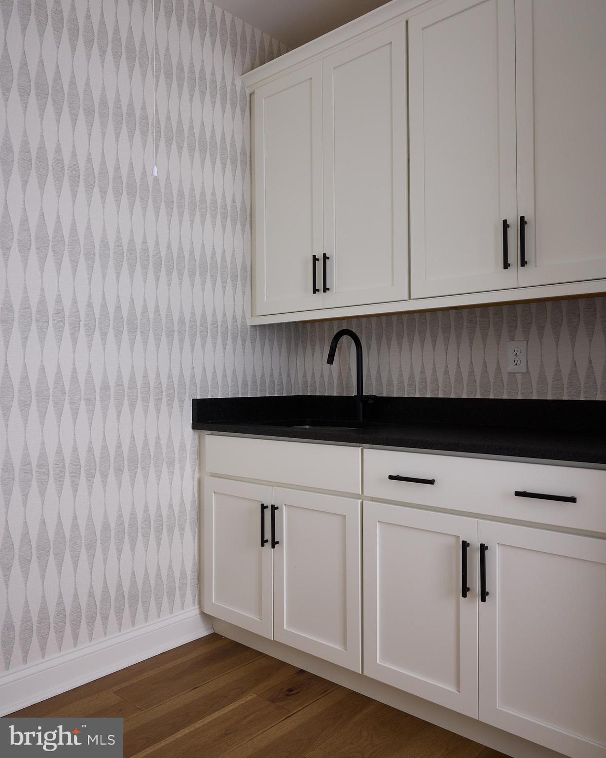 416 Glenway Road Glenside, PA 19038 - Photo 19 of 19 a close view of a stove a microwave and cabinets