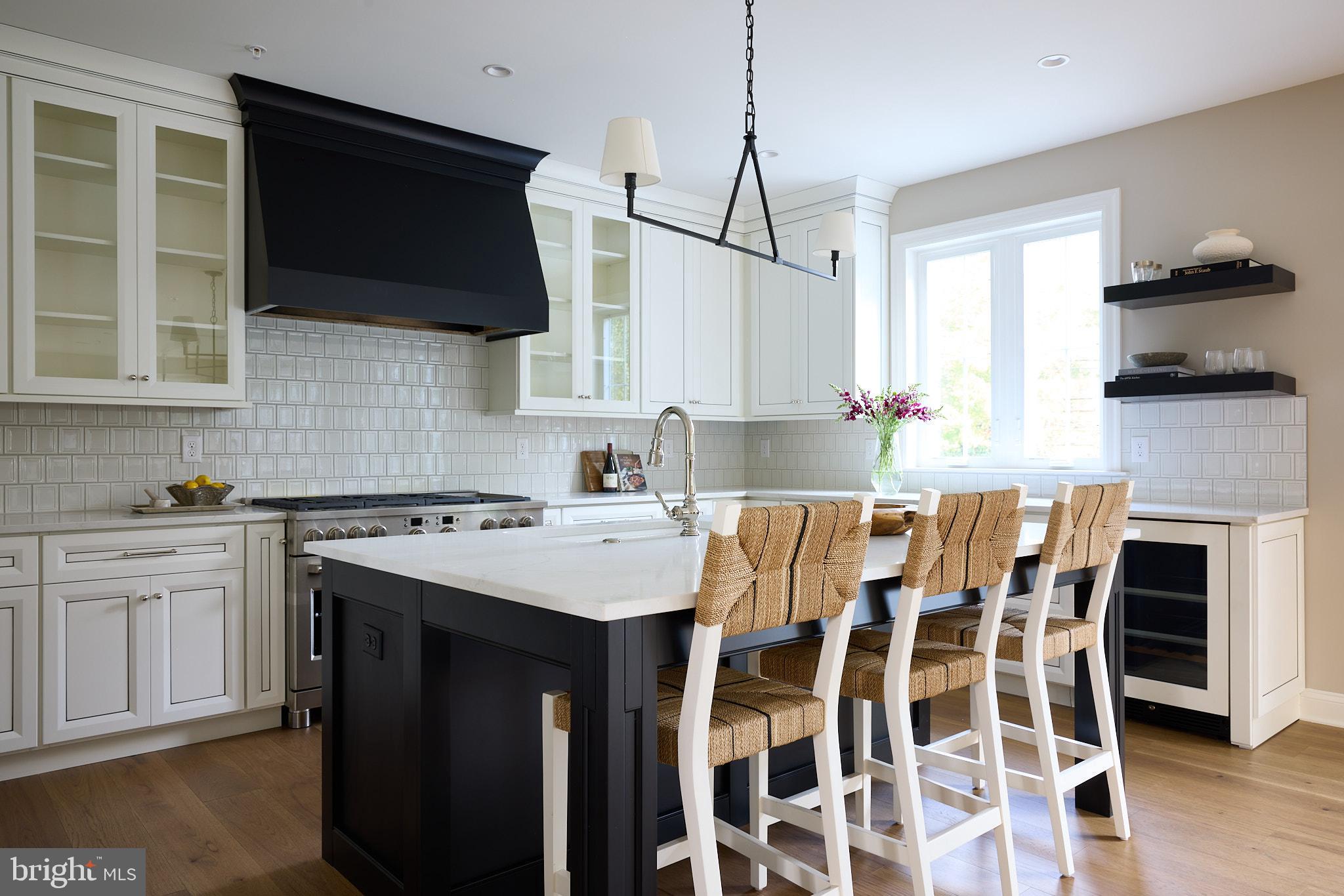 416 Glenway Road Glenside, PA 19038 - Photo 6 of 19 a kitchen with a stove a sink and a microwave