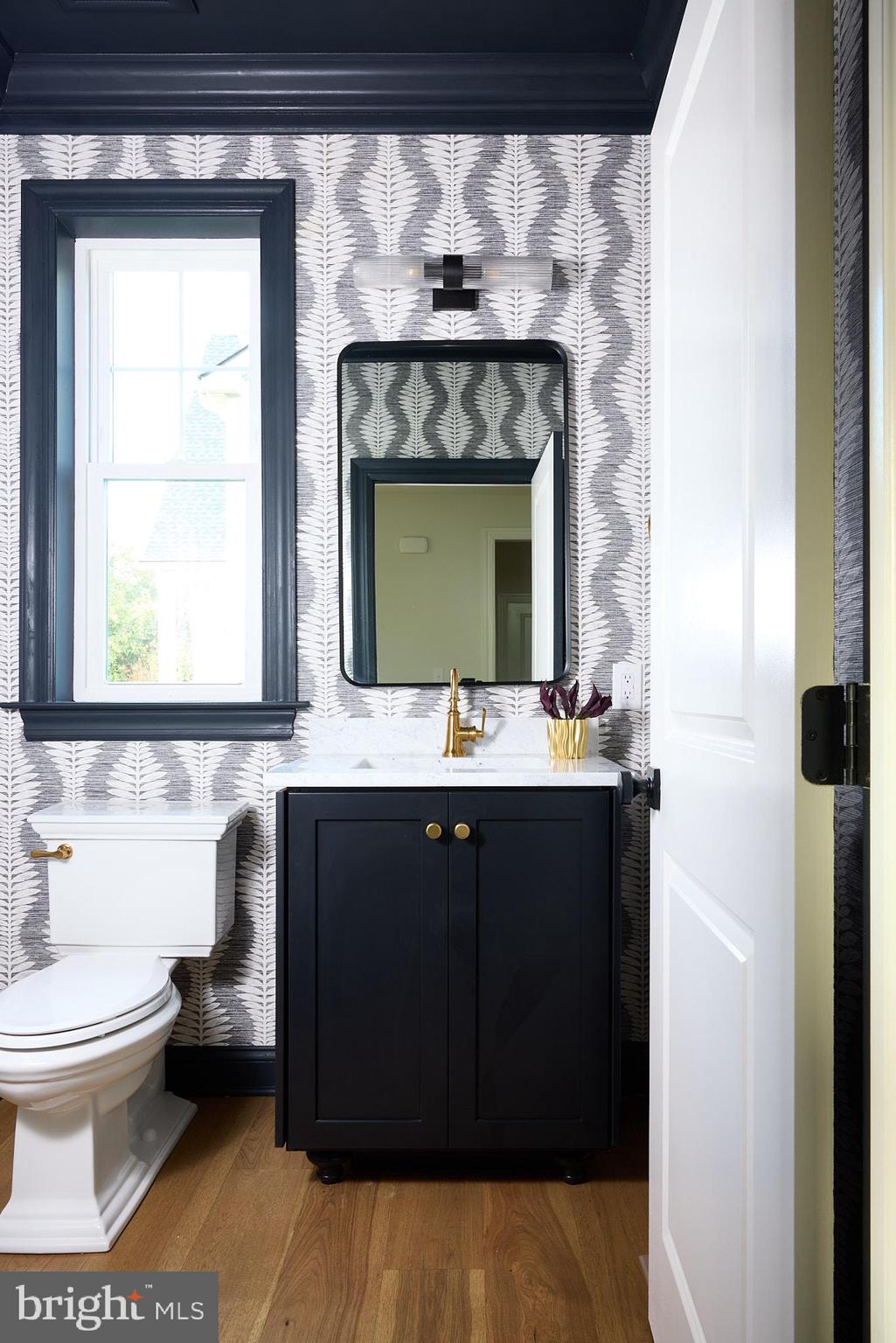 416 Glenway Road Glenside, PA 19038 - Photo 7 of 19 a bathroom with a sink and a mirror