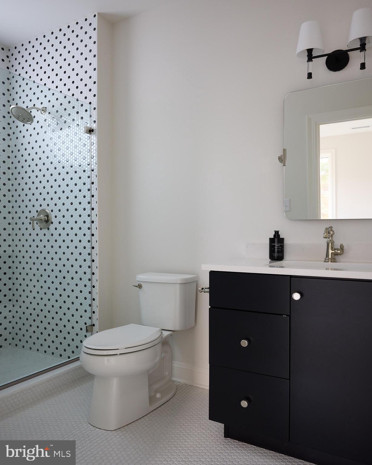 416 Glenway Road Glenside, PA 19038 - Photo 9 of 19 a bathroom with a toilet a sink and a shower