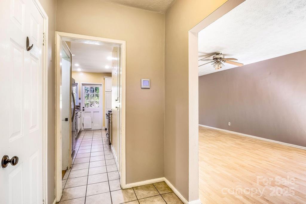 145 Beverly Road Asheville, NC 28805 - Photo 11 of 45 a view of a bathroom from a hallway