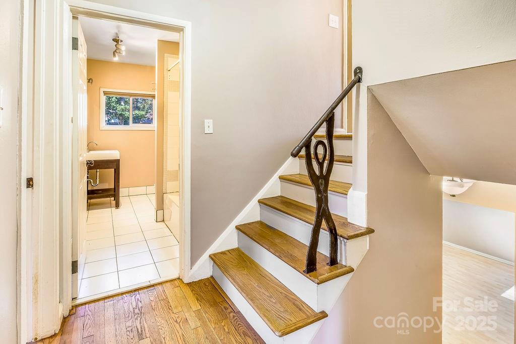 145 Beverly Road Asheville, NC 28805 - Photo 16 of 45 a view of entryway with wooden floor