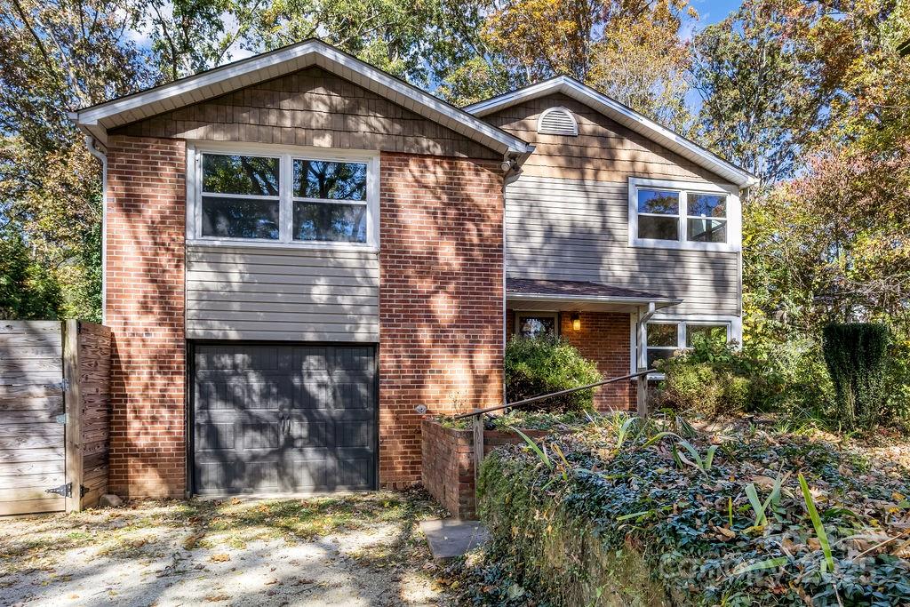 145 Beverly Road Asheville, NC 28805 - Photo 2 of 45 a house view with a outdoor space