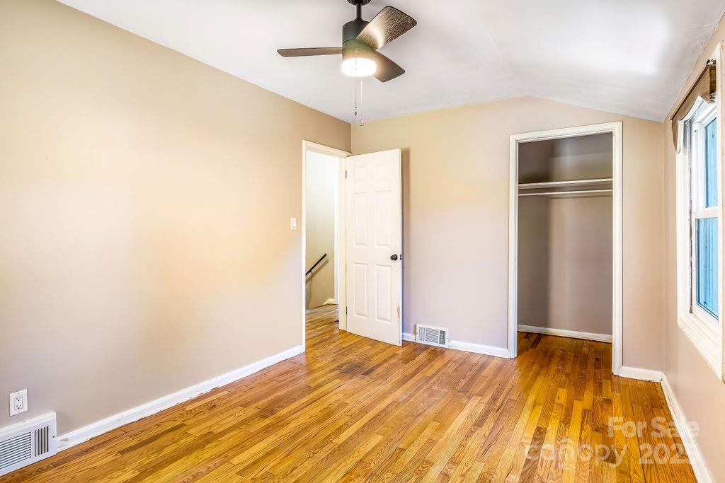 145 Beverly Road Asheville, NC 28805 - Photo 24 of 45 a view of empty room with wooden floor