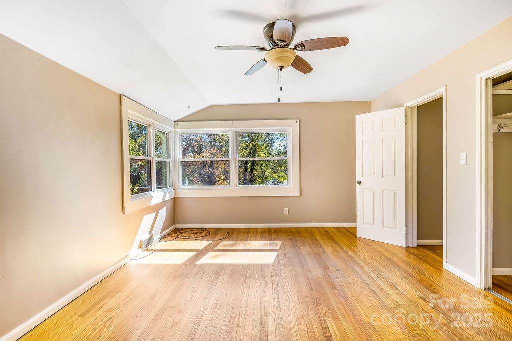 145 Beverly Road Asheville, NC 28805 - Photo 27 of 45 a view of an empty room with a window