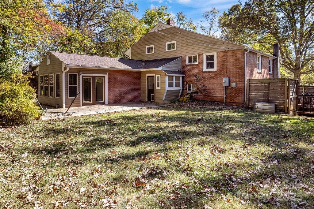 145 Beverly Road Asheville, NC 28805 - Photo 3 of 45 a view of a house with a yard