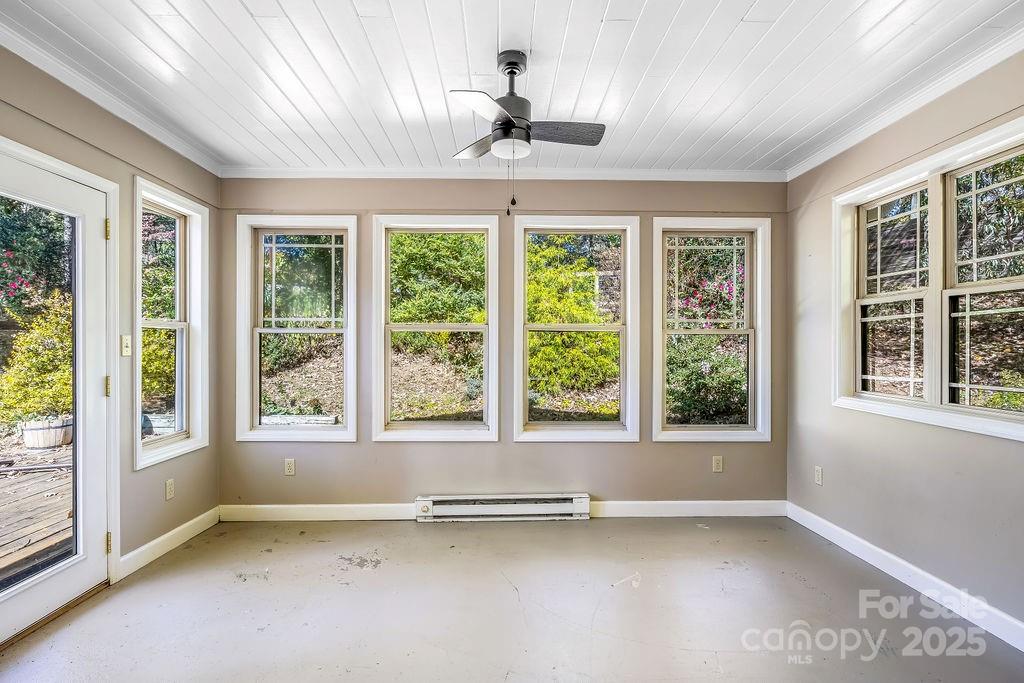 145 Beverly Road Asheville, NC 28805 - Photo 4 of 45 a view of an empty room with a window