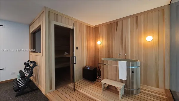 a view of a hallway with closet area