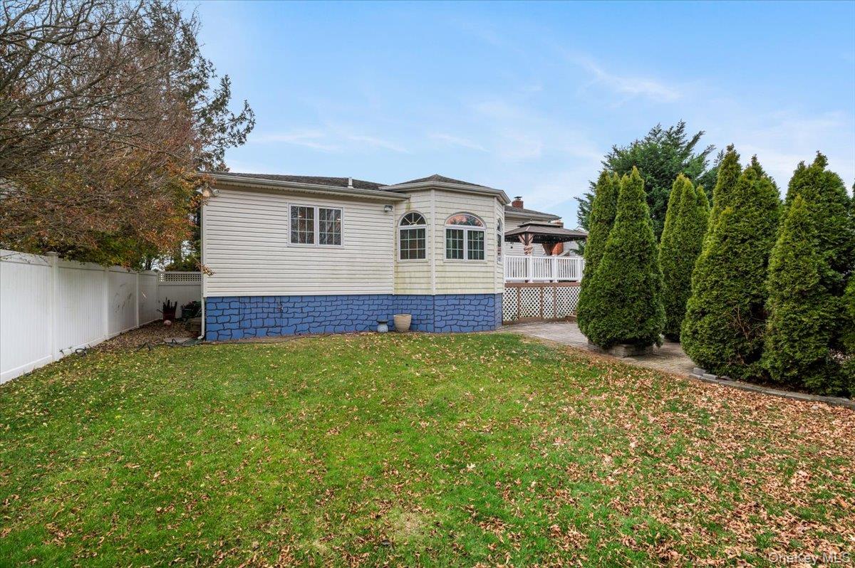 Undisclosed Address Bellmore, NY 11710 - Photo 29 of 30 a house view with a garden space