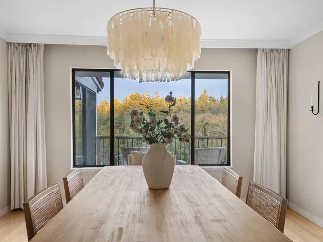a room with a sink and a potted plant